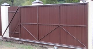 Купить откатные ворота из профнастила Тулун, цена от 1769 руб.