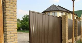 Купить откатные ворота из профнастила Тулун, цена от 1769 руб.